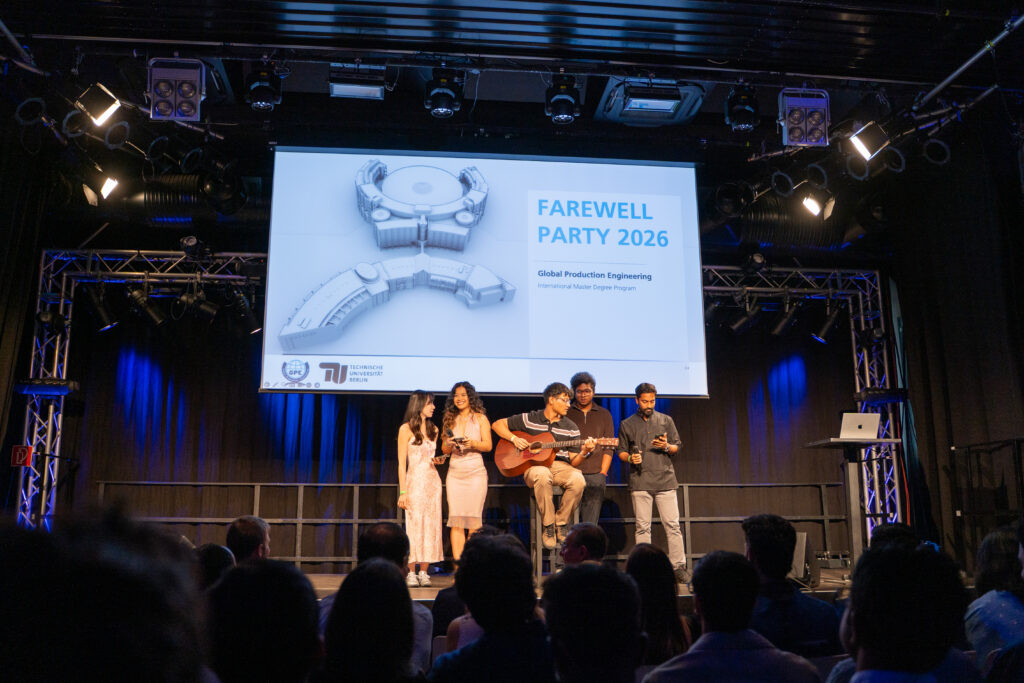 Live band performing on stage at the TU Berlin Global Production Engineering Farewell Party 2026, covered by an event photographer in Berlin