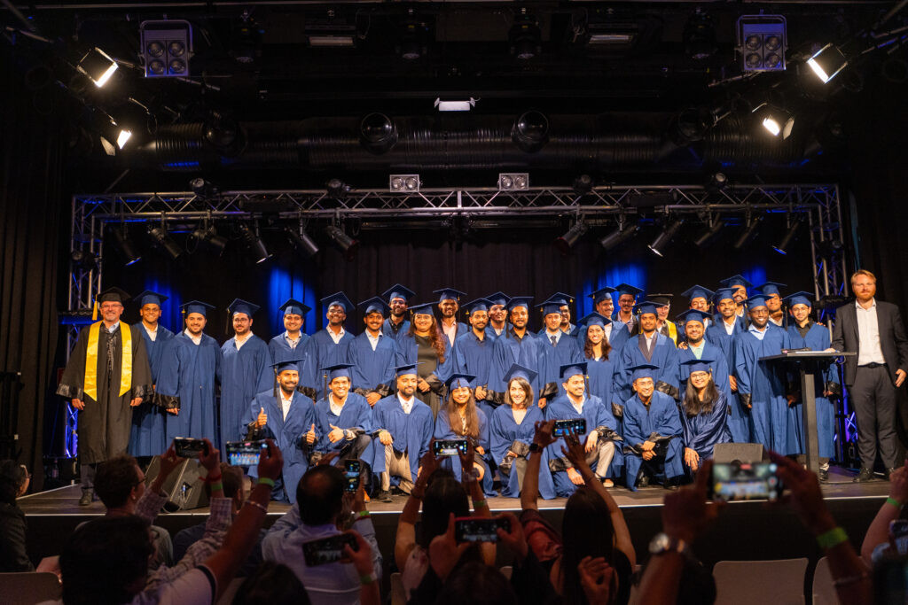 Global Production Engineering graduating class of 2026 on stage at TU Berlin Convocation and Farewell Party